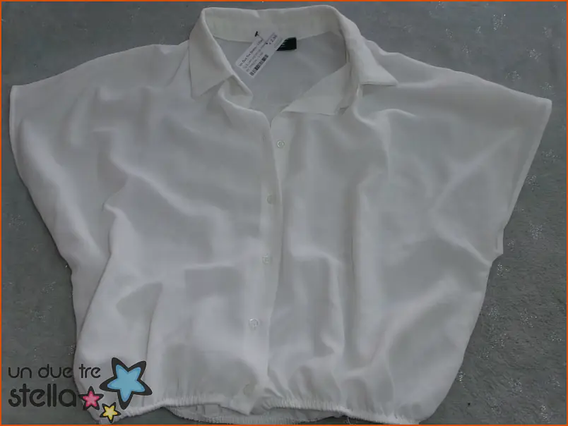 3793/24 - Tg.S camicia senza maniche bianco 