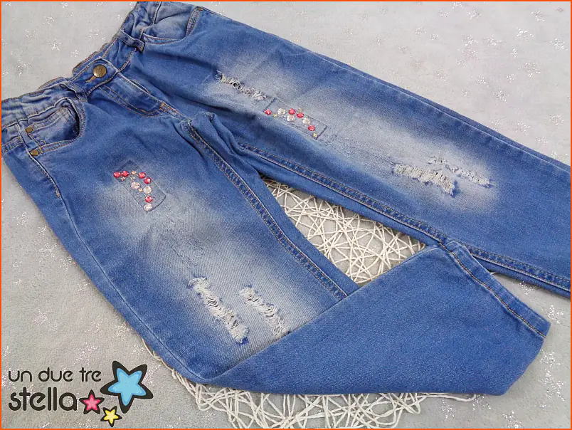 9292/23 - 7/8a jeans strappi pietre OVS